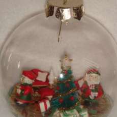 Santa and Mrs glass ornament