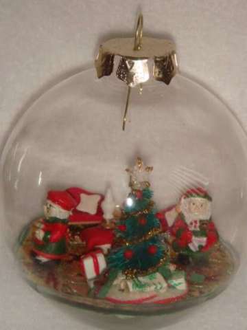 Santa and Mrs glass ornament