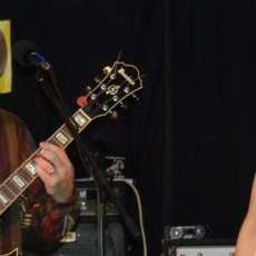 Dave Bolles /Rhythm Guitar - Kim Belsky vocal/percussion