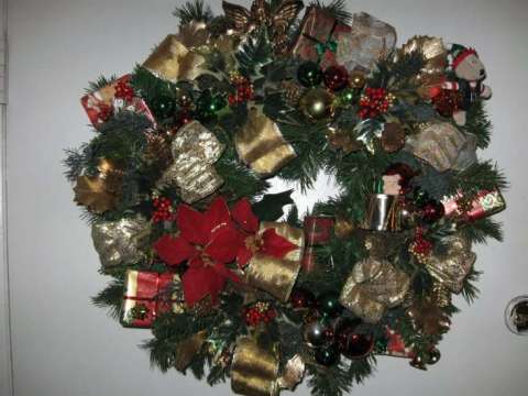 Gold bow wreath  $75.00