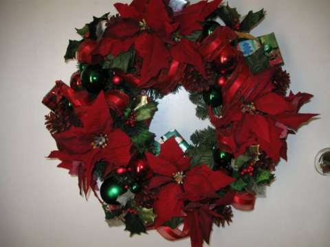 Poinsettia's and red ribbon   $60.00