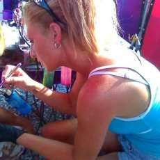 we offer temporary airbrush tattoos alcohol based paint so its easy to take off.   Have a very big selection of pictures