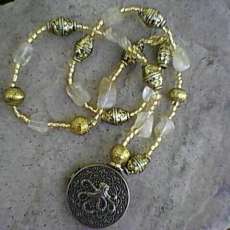 White and Gold Necklace with Sea Life Pendant