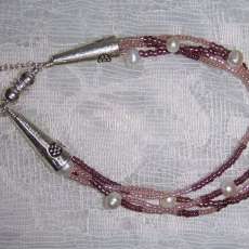 Magnetic clasp and glass pearl bracelet.