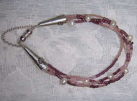 Magnetic clasp and glass pearl bracelet.