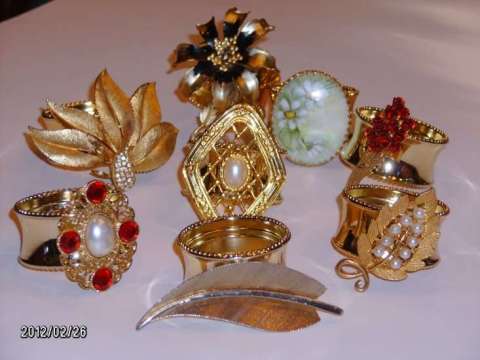 Napkin rings with attached vintage brooches