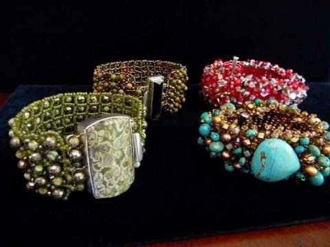 hand sewn cuffs with hand set cabachon and crystal clasps