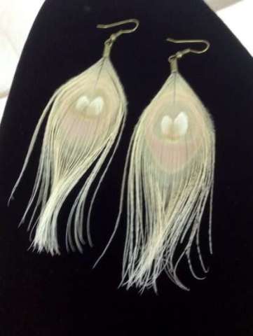 Ivory peacock feather earrings