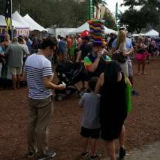 balloon twisting at a festival 2014