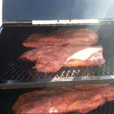 Briskets in the smoker trailer