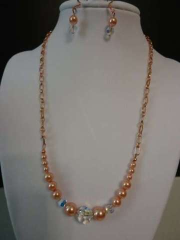 Rose Peach Swarovski pearls and crystals with copper chain
