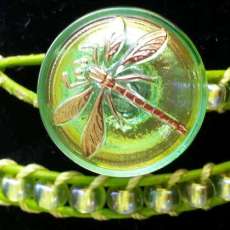 green button bracelet