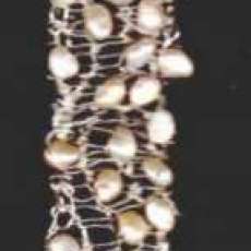 Hand knit sterling silver with freshwater pearls