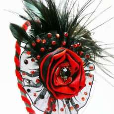Red rose with black feathers and velvet fascinator headband