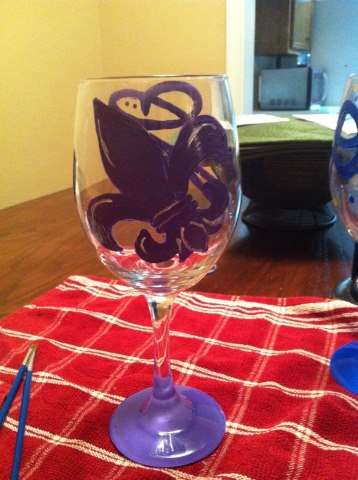 hand painted wine glass with initial and fleur de lis