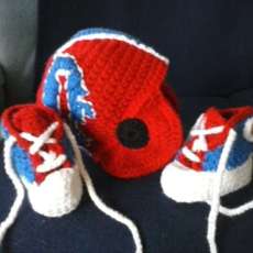 New born baby sports helmet and booties