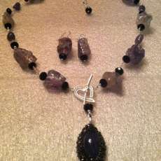 Tanzanite necklace and earring set accented with crystals