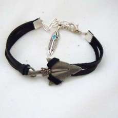Silver Arrowhead on Black Leather