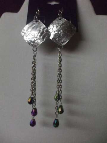 Silver metal earings with dangle chains and crystal blue stones