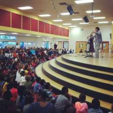 Demi at School Assembly