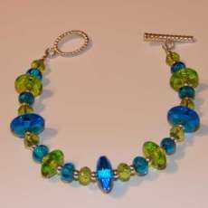 Grass green and aqua disk bracelet