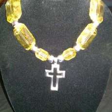 Yellow cross necklace set $45.00.