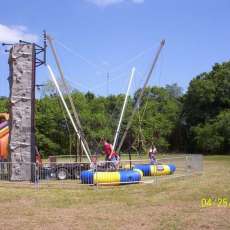 Rockwall/3 bungee trampoline combination foot print 38 foot x 38 foot x 30 foot high circle once set up including fence. This is all space needed to operate in