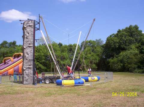 Rockwall/3 bungee trampoline combination foot print 38 foot x 38 foot x 30 foot high circle once set up including fence. This is all space needed to operate in