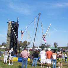 A lot of fun for all, the participants and the ones watching and encouraging the participants to climb higher on the wall or to do flips