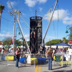 Set up in 2 lane street if it has parking on both sides also depending on power lines as seen here.
