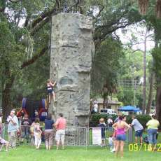 The rockwall by itself takes an area of 18 foot wide x 20 foot deep x 26 foot high. This is all space needed to operate including the fence. As mentioned before allot of spectators just watching making for good entertainment for all!