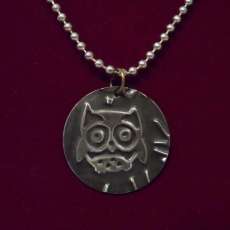 Brass embossed pendant