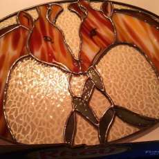 Two giraffe's sharing lunch