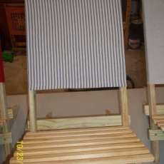 Small black stiriped cloth back chair