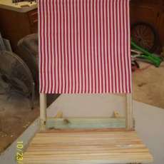 Small red and white striped cloth chair