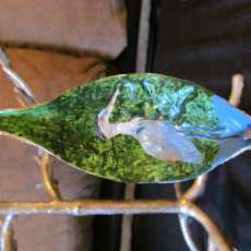 blue heron painted on milkweed pod