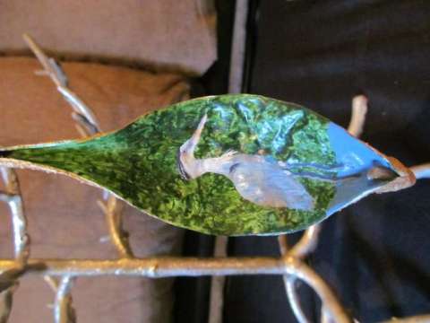 blue heron painted on milkweed pod
