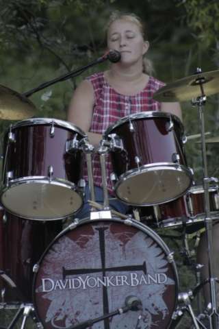 Sheryl drumming and worshipping