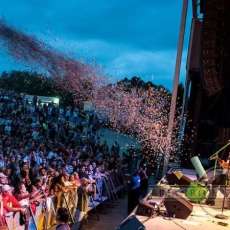 16,000 pieces of confetti...(One for each person.)
