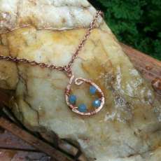 Hammered Copper Necklace With Blue Czech Glass