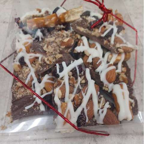 Chocolate Bark With Almonds, Pecans, Dried Cranberries, Pretzels and Drizzled With W\White Chocolate