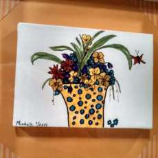 Polka dotted plant and vase