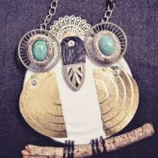 Hand crafted owl from tin can lid