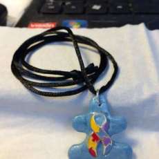 autism awareness puzzle piece pendant