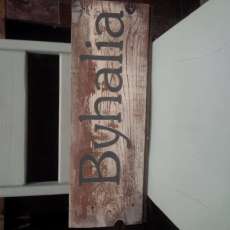 Blue chair with Byhalia sign