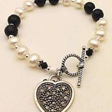 Onyx Bracelet with heart charm