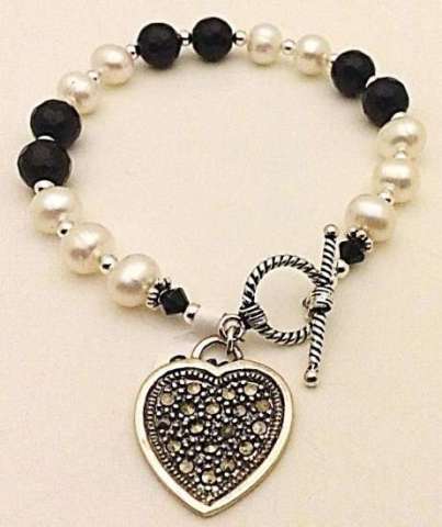 Onyx Bracelet with heart charm