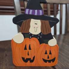 Witch With Jack O Lantern Pumpkins
