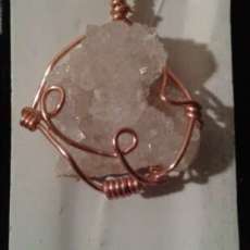Wire wrapped crystal
