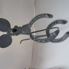 Metal Dog Made From Horse Shoe